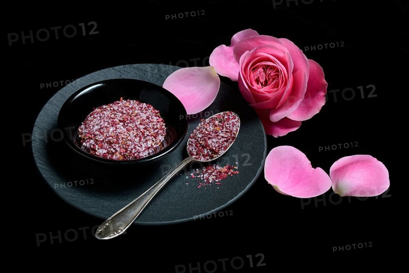 Rose salt in bowl and spoon
