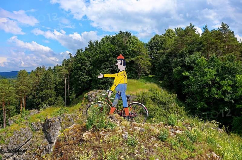Aerial view of the rock above Oberailsfeld with cyclist figure