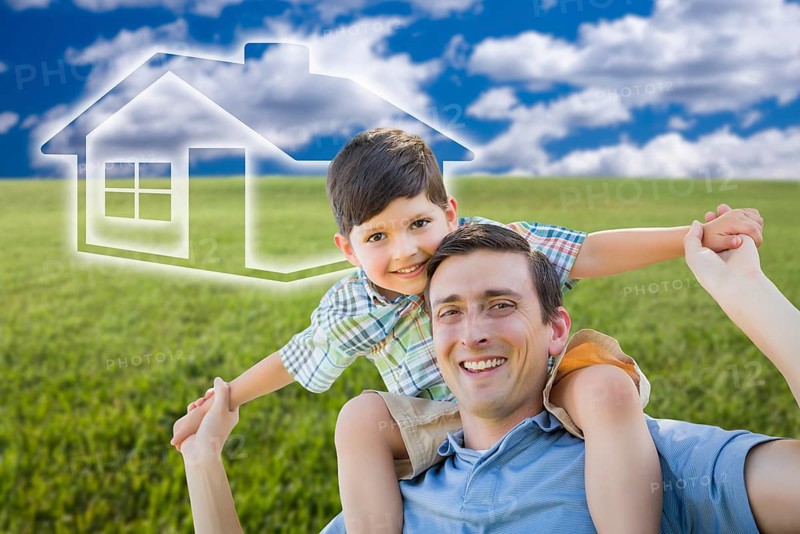 Excited mixed-race father and son piggyback over grass field