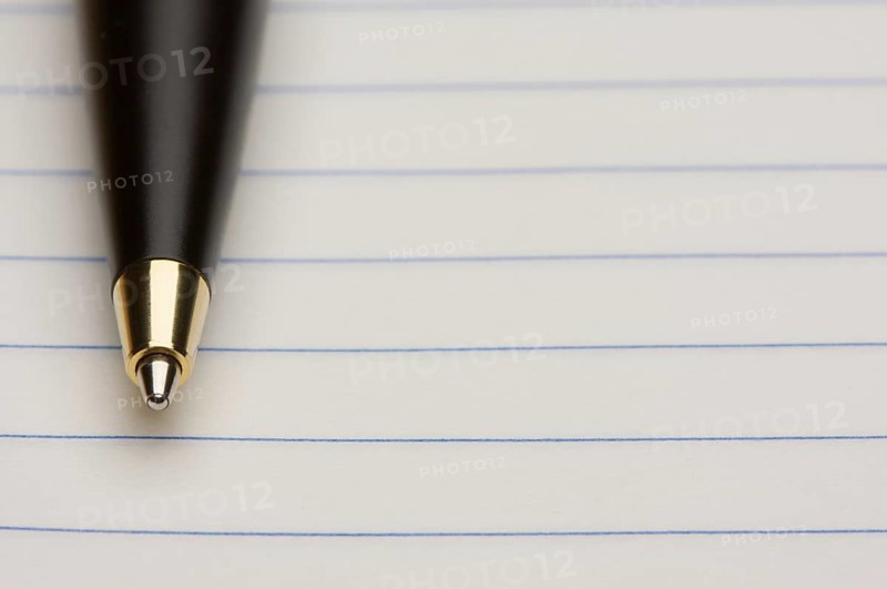 Pen and pad of lined paper
