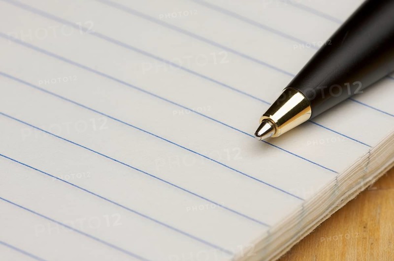 Pen and pad of lined paper