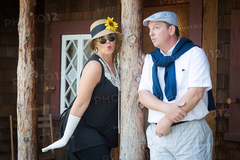 Young attractive couple dressed in outfits from the twenties era