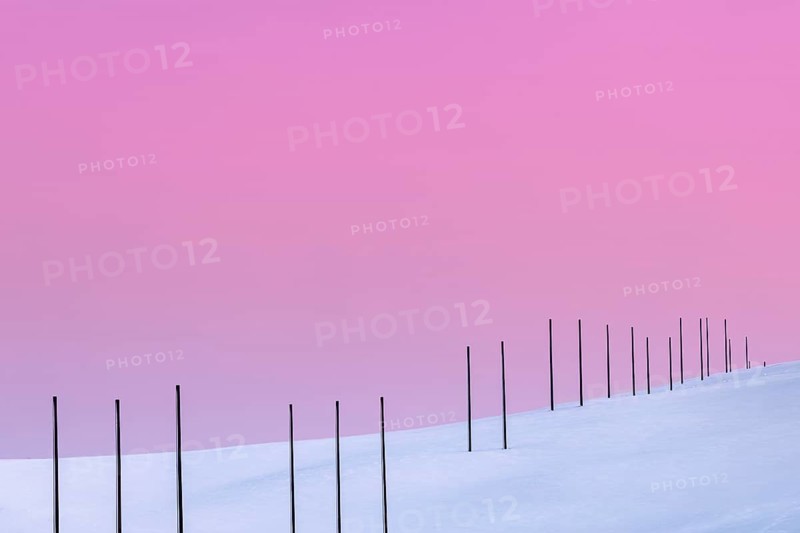 Electricity pylons in winter landscape