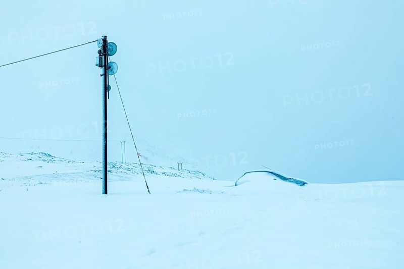 Snowed-in car in winter