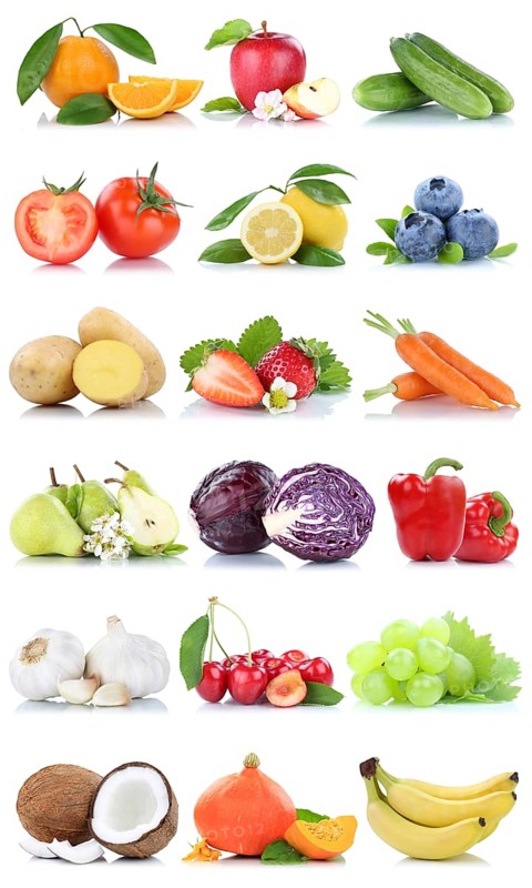 Fruit and vegetables fruits apple orange lemon berries carrots bananas cropped isolated against a white background in Germany