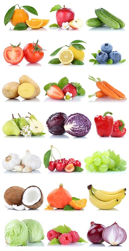 Fruit and Vegetable Fruits Apple Orange Lemon Berries Carrot Salad isolated on a white background in Germany