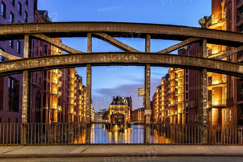 Moated castle Speicherstadt castle by night in Hamburg
