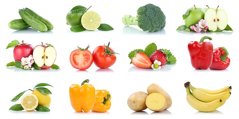 Fruits fruits and vegetables apple tomatoes orange lemon bananas colors collection cropped isolated against a white background in Germany