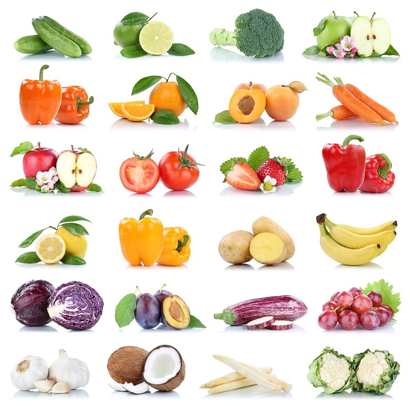 Fruits fruits and vegetables apple tomatoes orange lemon garlic colors collection cropped isolated against a white background in Germany