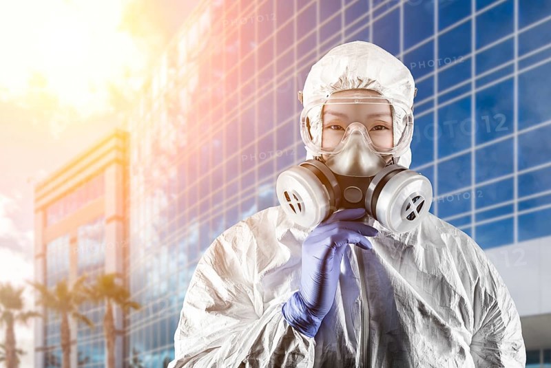 Chinese woman wearing hazmat suit