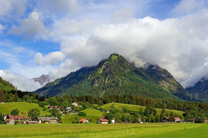 View from the Lorettowiesen to the mountain Riefenkopf 1748 m with low clouds