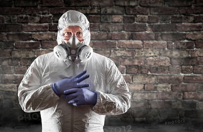 Man wearing hazmat suit