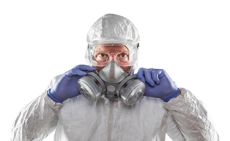 Man wearing hazmat suit