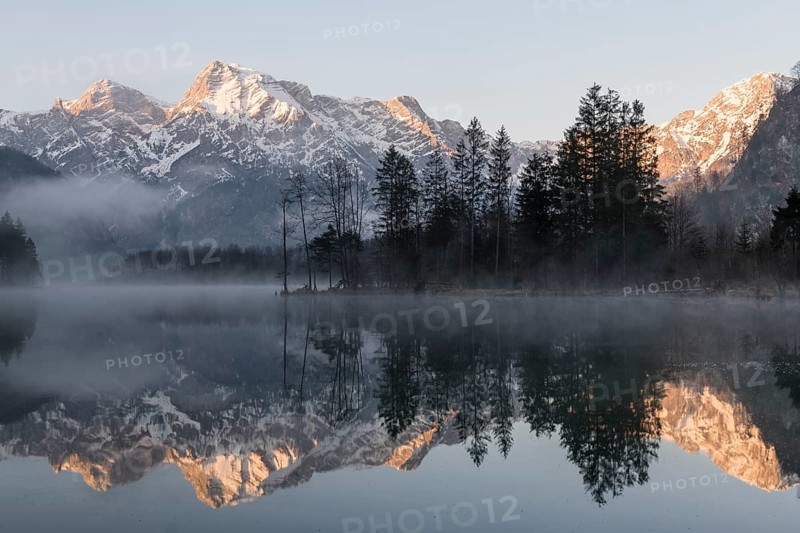 Alpine lake with reflection