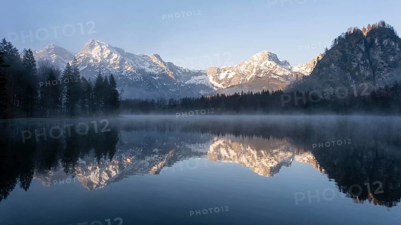 Alpine lake with reflection