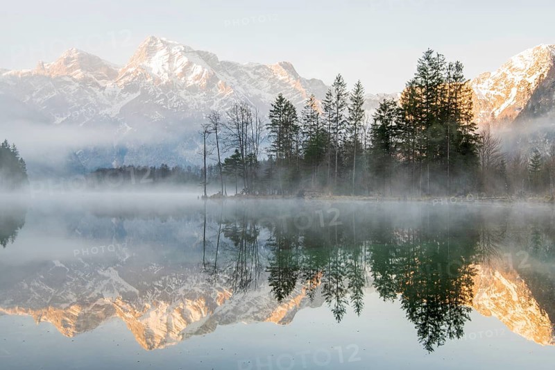 Alpine lake with reflection