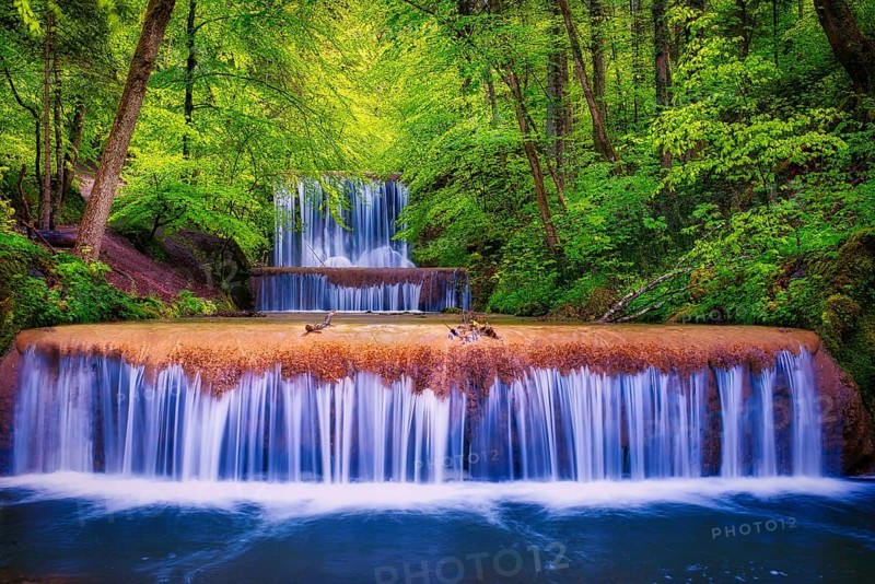 Village stream with waterfalls