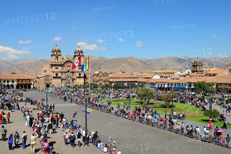 Plaza de Armas with Cathedral Catedral Basilica de la Virgen de la Asuncion in front of a parade