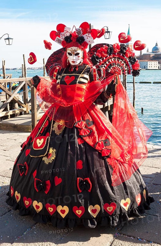 Woman in carnival constume and mask on carnival in Venice