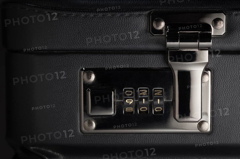 Briefcase abstract with the numbers 911 on lock