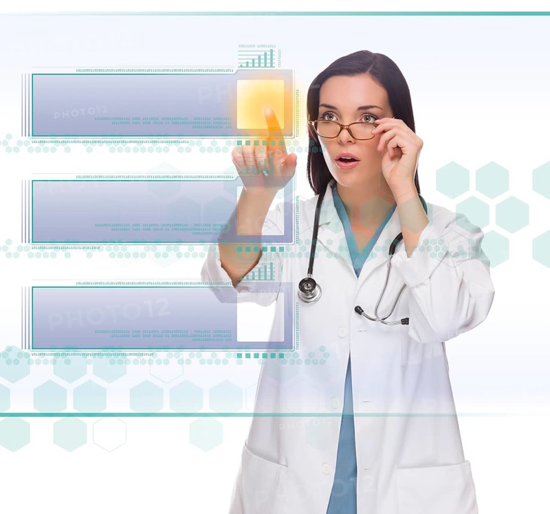 Young doctor or nurse pushing blank button on futuristic translucent panel