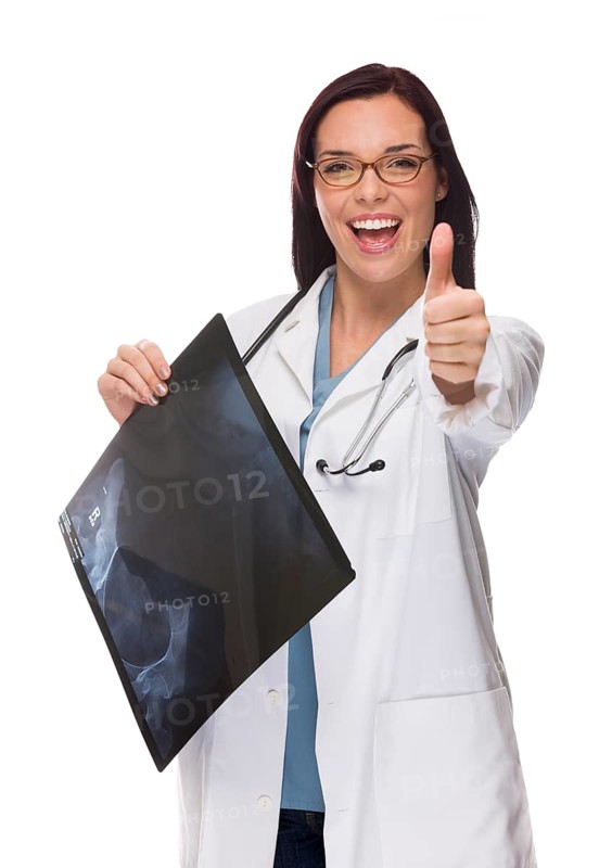 Attractive mixed-race female nurse or doctor wearing lab coat and stethoscope holding x-ray giving a thumbs up isolated on a white background