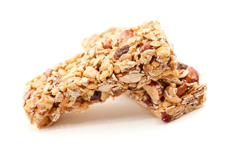 Two nutritious granola bars isolated on white