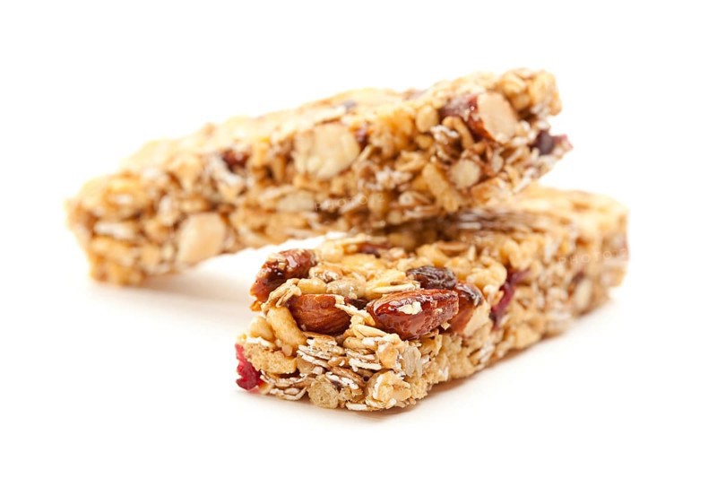 Two nutritious granola bars isolated on white