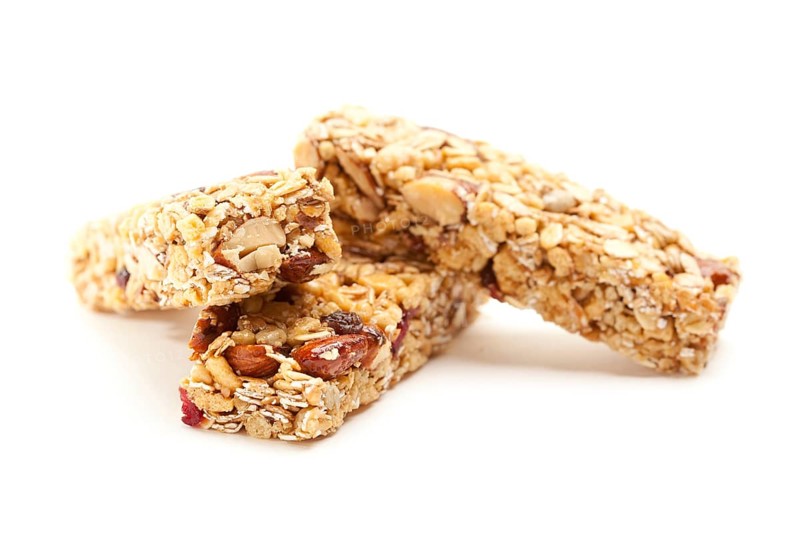 Two nutritious granola bars isolated on white