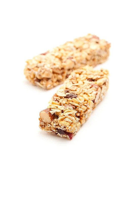 Two nutritious granola bars isolated on white