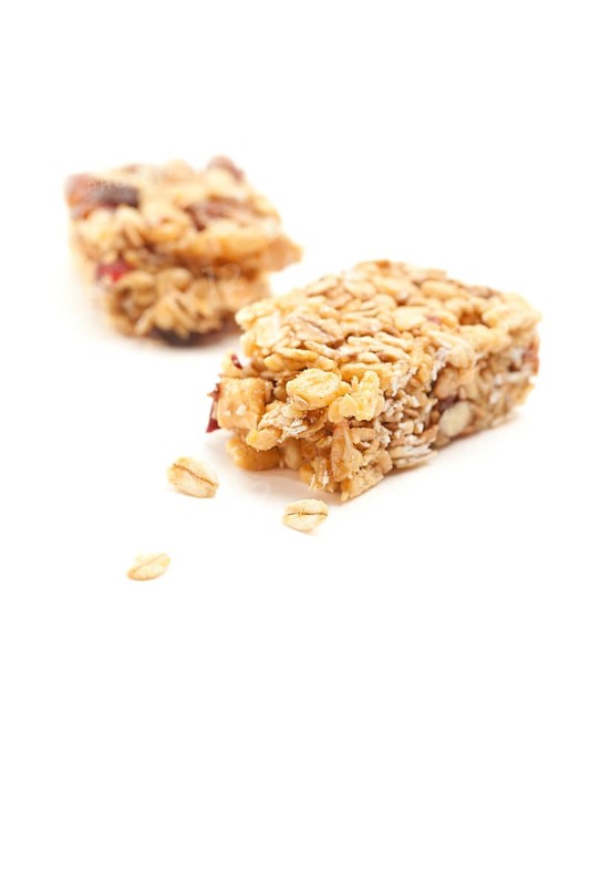 Broken granola bar isolated on a white background