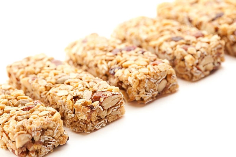 Row of several granola bars isolated on a white background