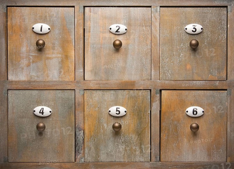 Antique wood filing cabinet drawers image