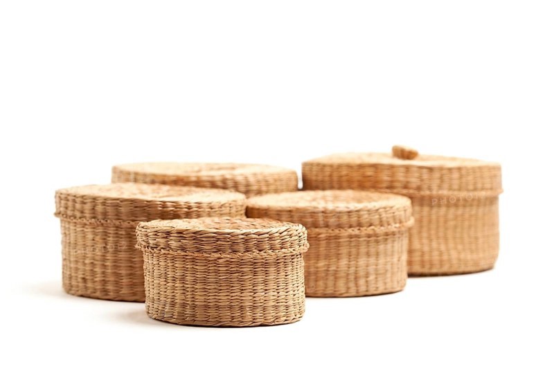 Various sized wicker baskets isolated on white