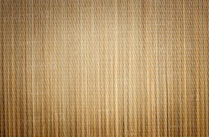 Bamboo mat background image with vignette ready for your own text
