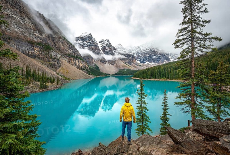 Young man looking at mountains