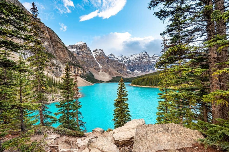 Mountain range behind turquoise glacial lake