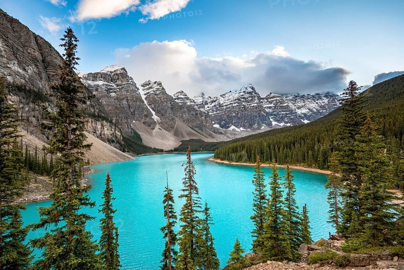 Mountain range behind turquoise glacial lake