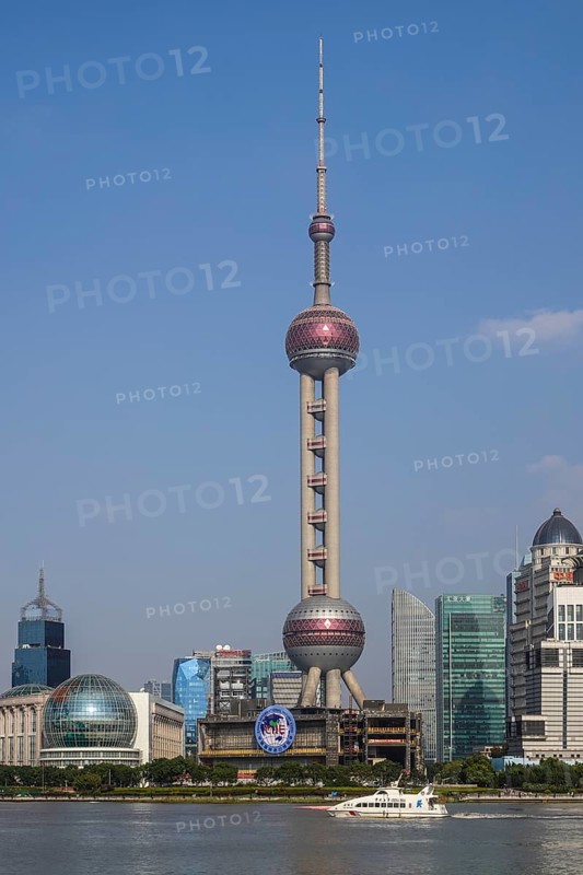 View over the Huangpu River to the skyline of the special economic zone Pudong with Oriental Pearl Tower