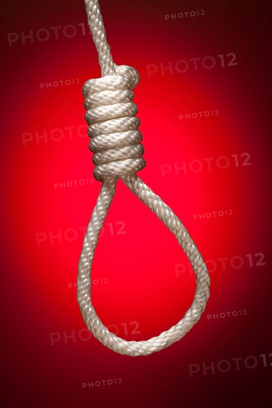 Hangman's noose over red spot lit background