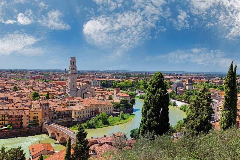 City view Verona with the stone bridge Ponte Pietra and the river Adige