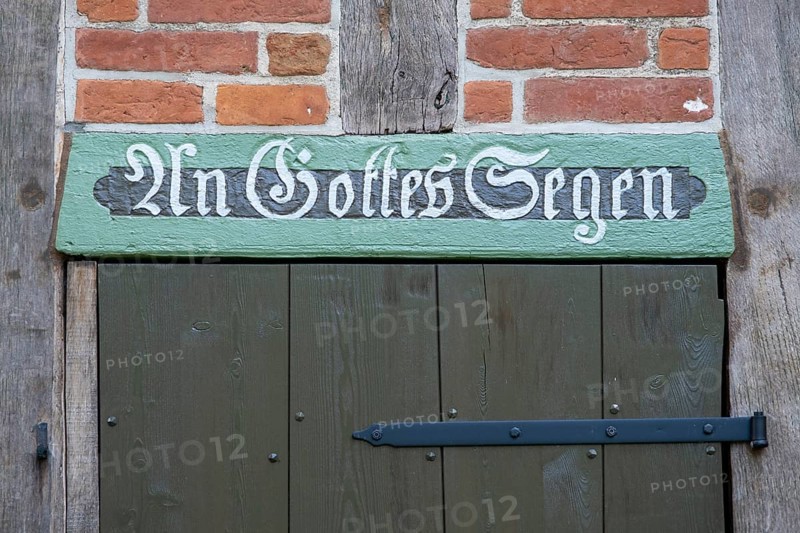Half-timbered house in the round village of Satemin