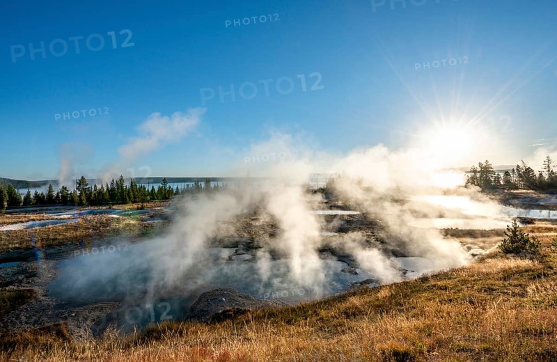 View of steaming hot springs in the morning sun