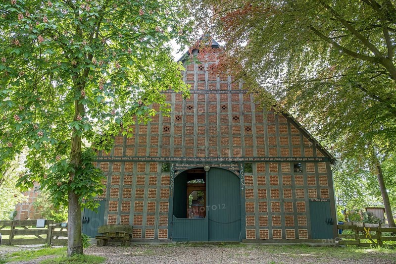 Half-timbered house in the round village Satemin