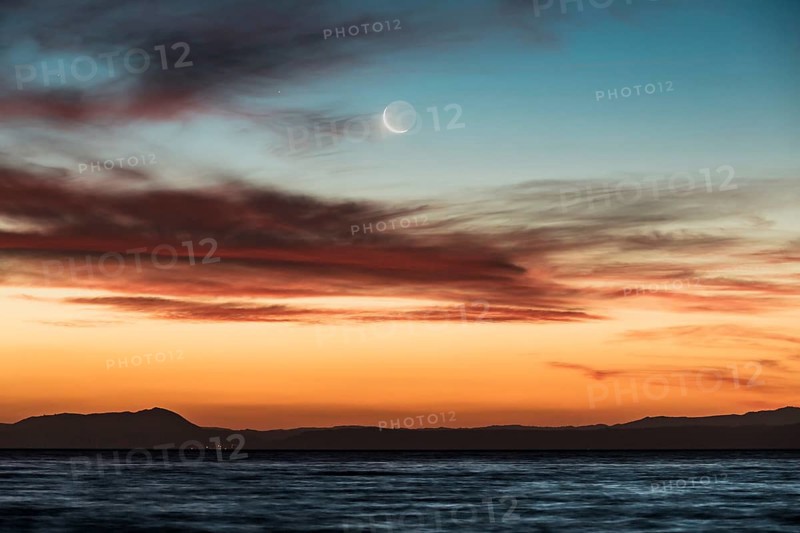 Moon at sunset at Lake Taupo