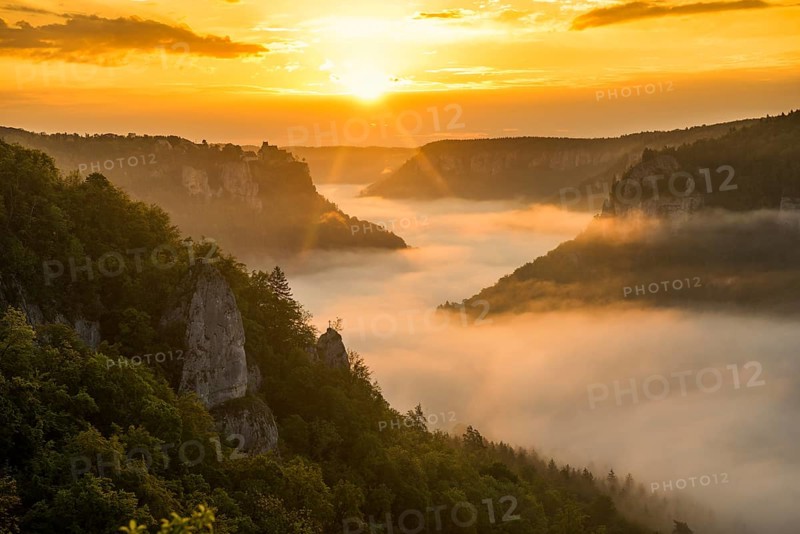 View from Eichfelsen to Werenwag Castle with morning fog