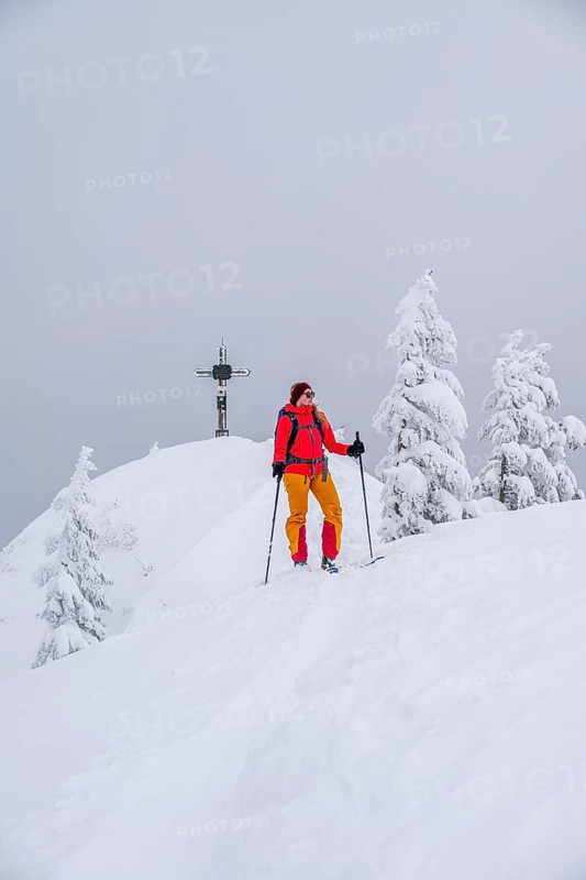 Young woman on ski tour