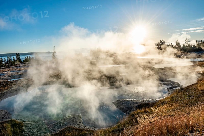 View of steaming hot springs in the morning sun