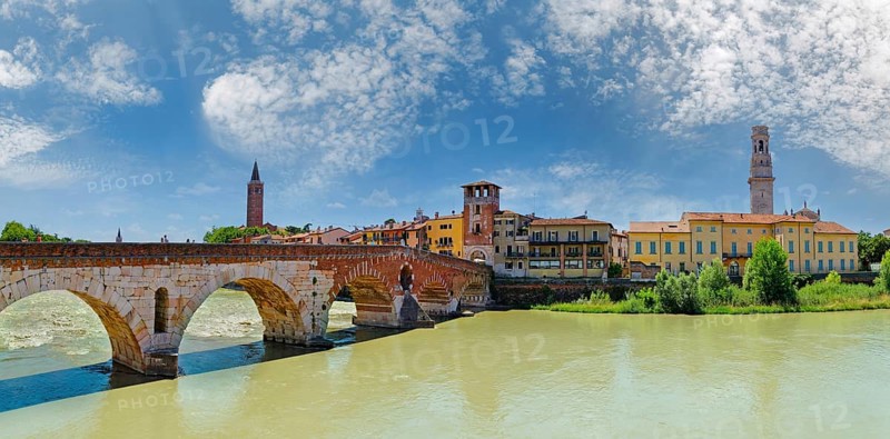 River Adige with city view and the stone bridge Ponte Pietra