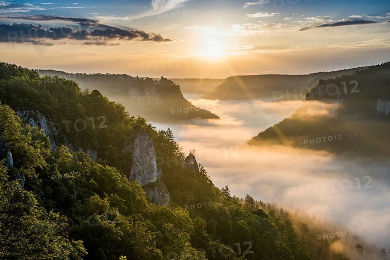 View from Eichfelsen to Werenwag Castle with morning fog